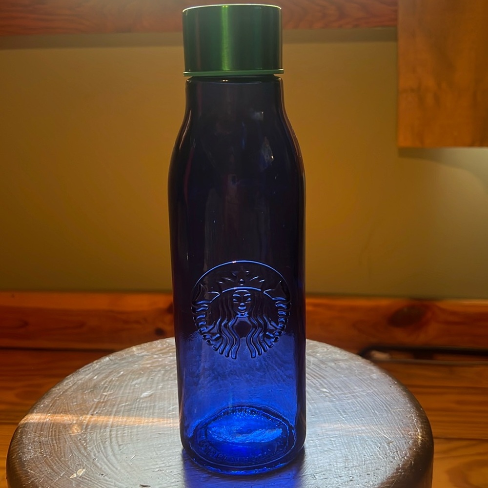 Starbucks recycled blue glass water bottle.